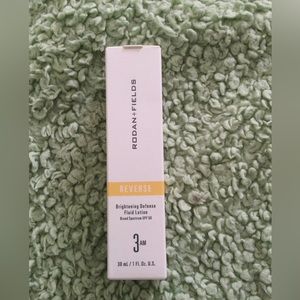 Rodan & fields Reverse Brightening Defense Fluid lotion